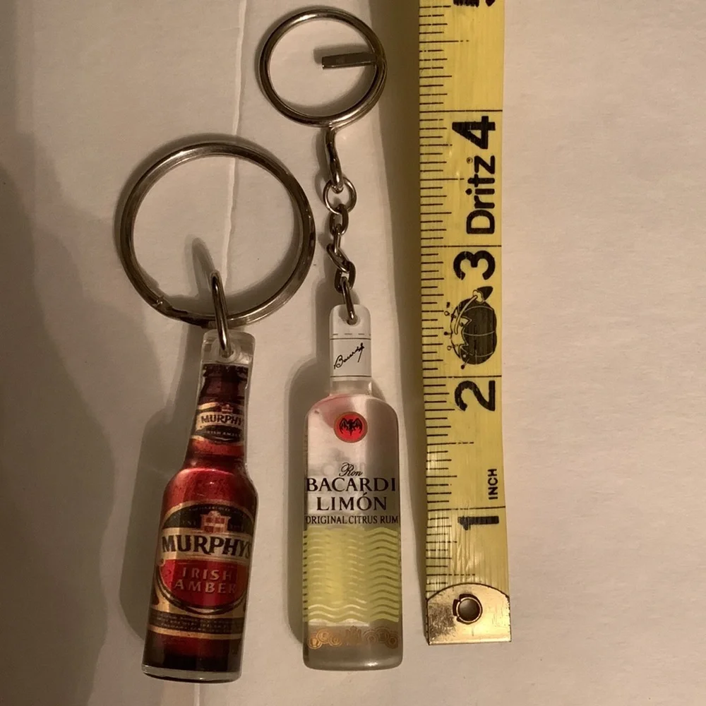 2 liquor keychains Bicardi Limon Murphys Irish amber